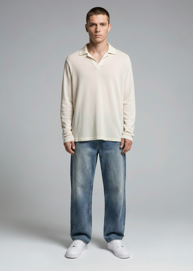 Full body view of the model wearing NWRLD 003 / Sun Fade Heavyweight Denim Jeans