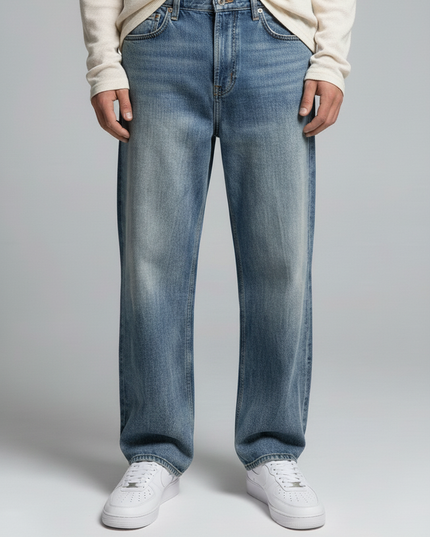Close-up of the model's lower body wearing NWRLD 003 / Sun Fade Heavyweight Denim Jeans