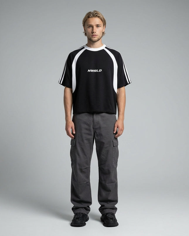 Full body view of the model wearing NWRLD 002 Contrast Panel Mesh T-shirt
