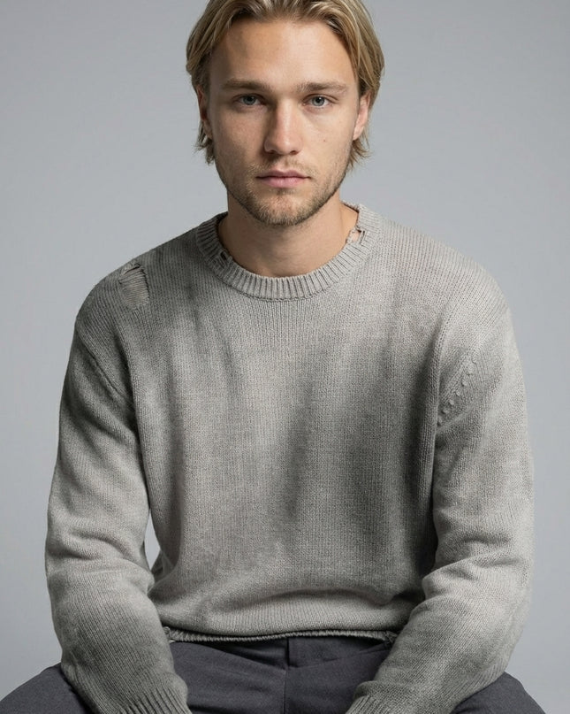 Close-up of the model wearing Sun Fade Distressed Ripped Crewneck sweater