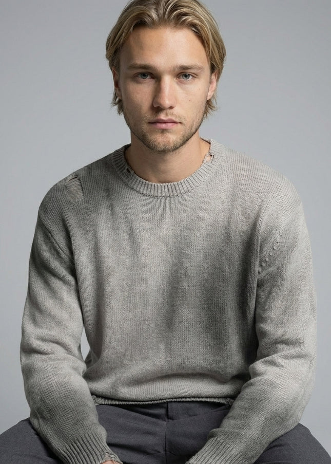 Close-up of the model wearing Sun Fade Distressed Ripped Crewneck sweater