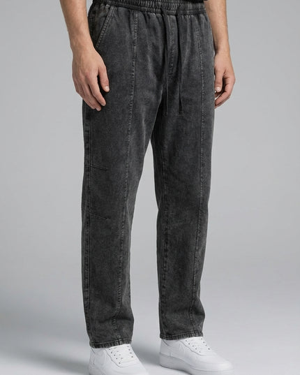 Close-up of the model's lower body wearing Snow Wash Drawstring Cotton Pants