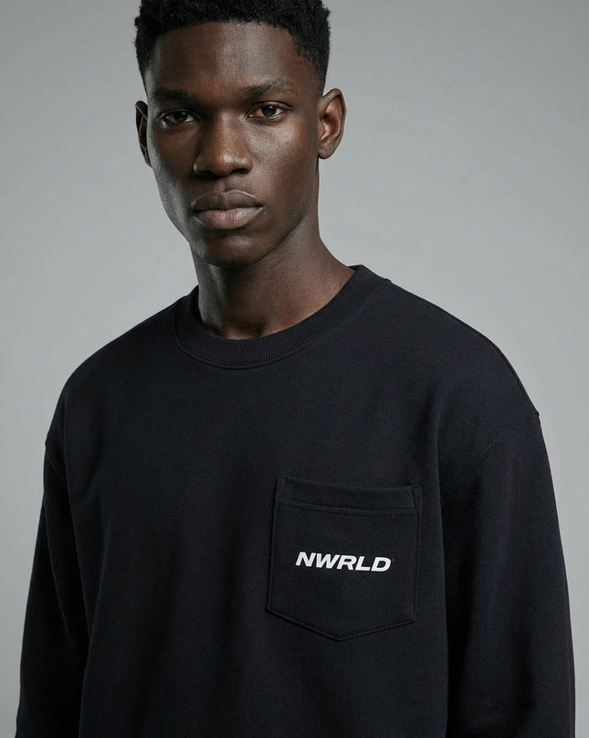 Close-up of the model wearing NWRLD 002 Heavyweight Crewneck Sweatshirt