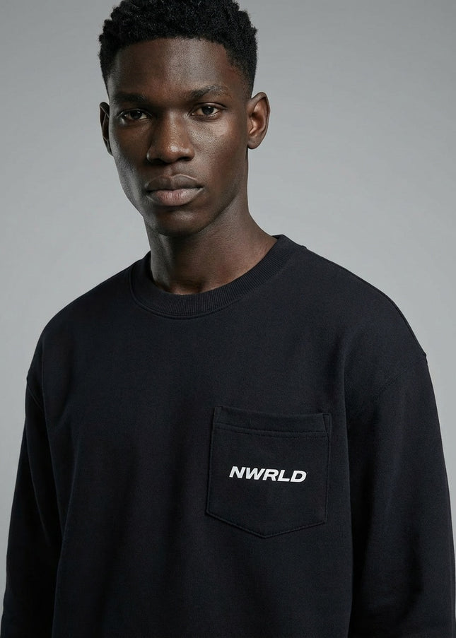 Close-up of the model wearing NWRLD 002 Heavyweight Crewneck Sweatshirt