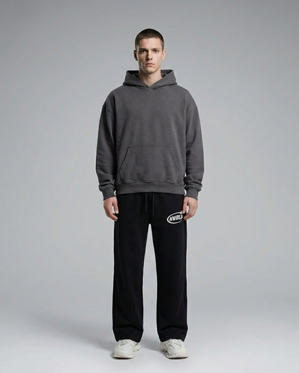 Full body view of the model wearing NWRLD 002 Contrast Tape Straight-Leg