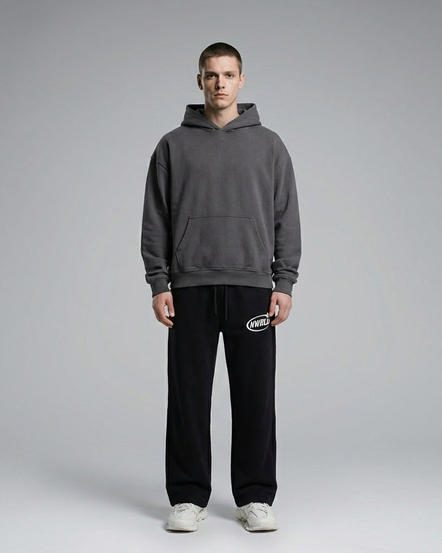 Full body view of the model wearing NWRLD 002 Contrast Tape Straight-Leg