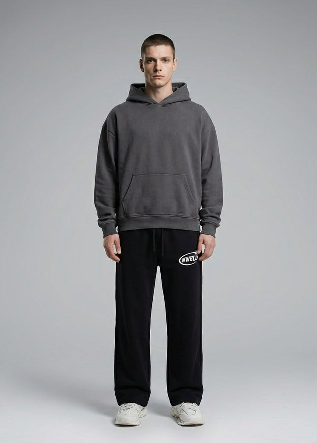 Full body view of the model wearing NWRLD 002 Contrast Tape Straight-Leg