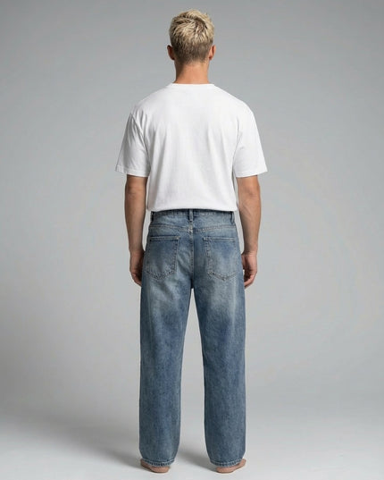 Back pose of the model wearing Sun Fade Heavyweight Denim Jeans