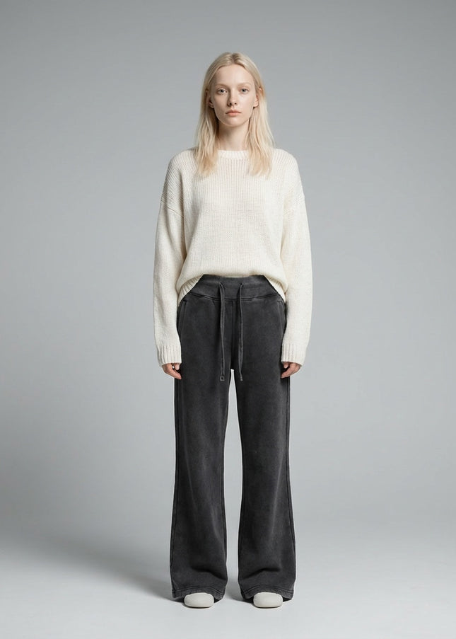 Full body view of the model wearing DROP 003 / Vintage Washed Flared Fleece Pants