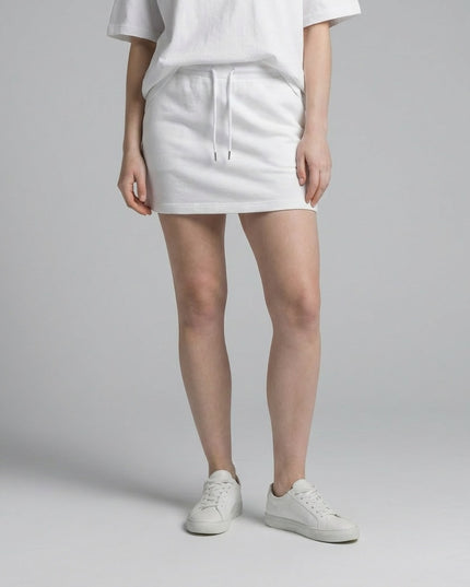 Close-up of the model's lower body wearing Essential Drawstring Skirt