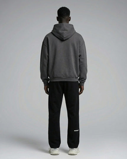 Back pose of the model wearing Essential Drawstring Straight-Leg Sweatpants