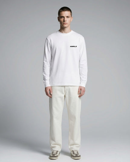 Full body view of the model wearing Essential Crewneck Long-Sleeve T-Shirt