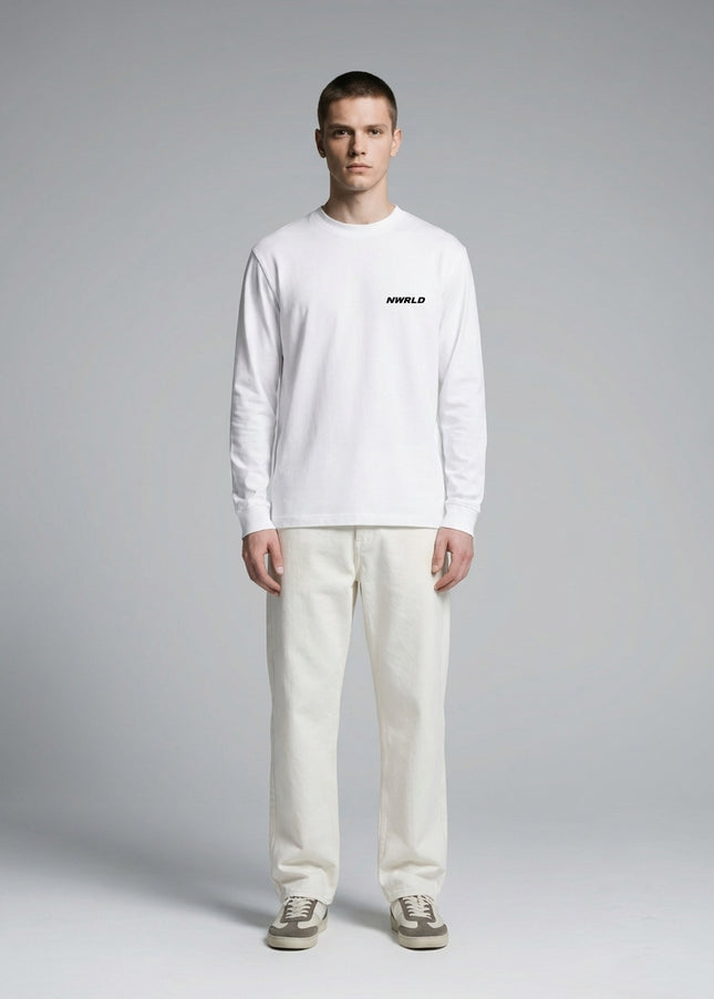 Full body view of the model wearing Essential Crewneck Long-Sleeve T-Shirt