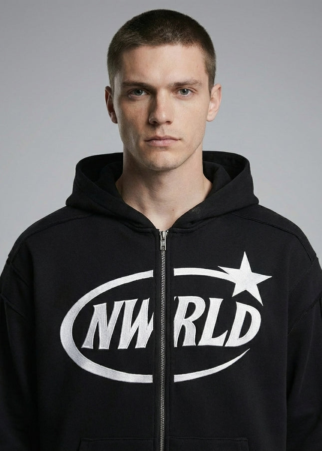 Close-up of the model wearing NWRLD 002 Contrast Tape Zip Hoodie