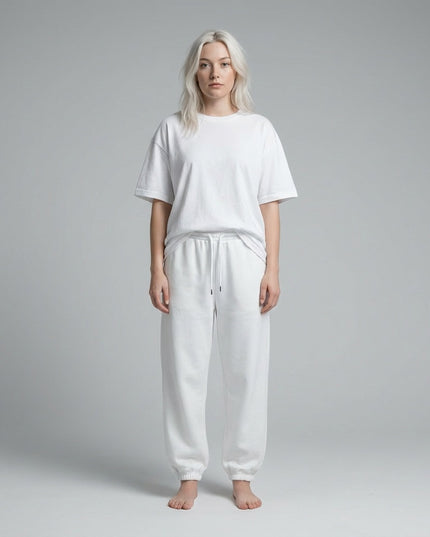 Full body view of the model wearing Essential Jogged Sweatpants