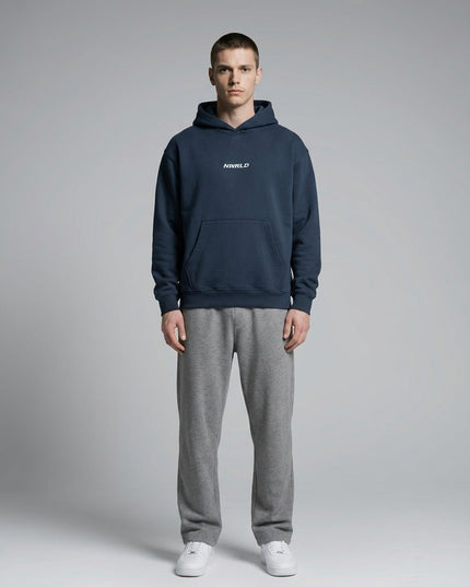 Full body view of the model wearing Essential Oversized Boxy Fit Fleece Hoodie