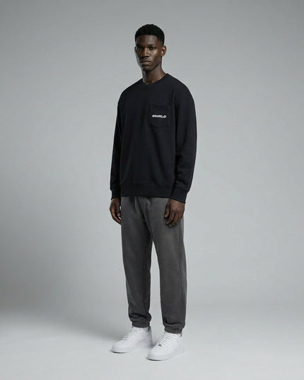 Model wearing NWRLD 002 Heavyweight Crewneck Sweatshirt