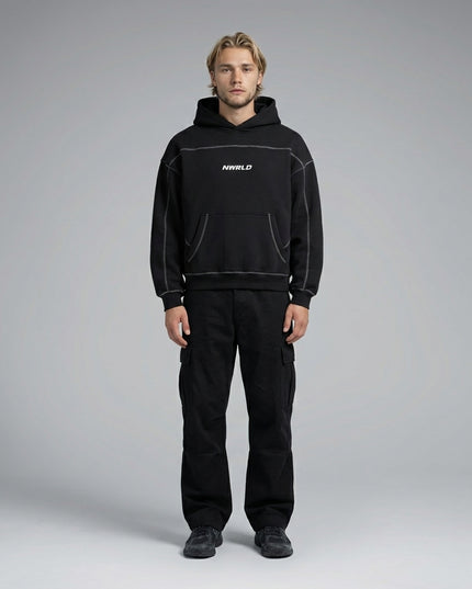 Full body view of the model wearing Contrast-Stitched Boxy Fleece Hoodie