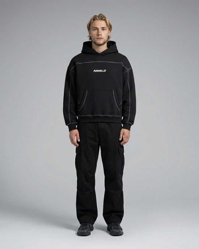 Full body view of the model wearing Contrast-Stitched Boxy Fleece Hoodie