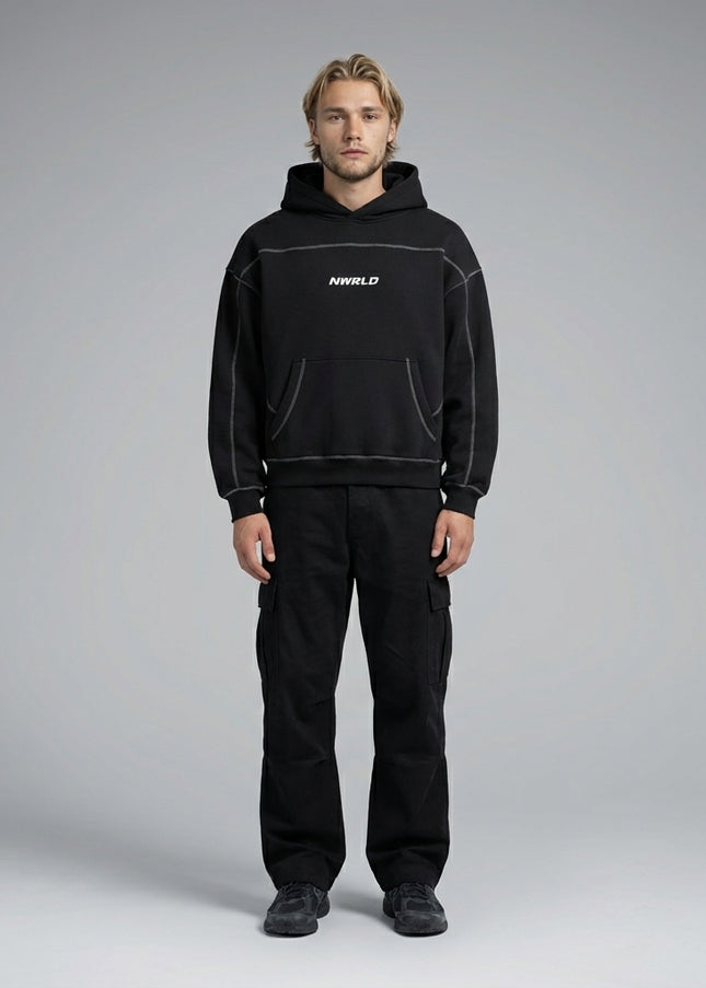 Full body view of the model wearing Contrast-Stitched Boxy Fleece Hoodie