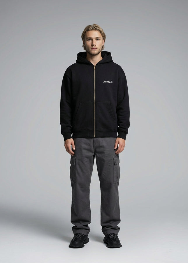 Full body view of the model wearing Essential Oversized Fleece Boxy Hoodie