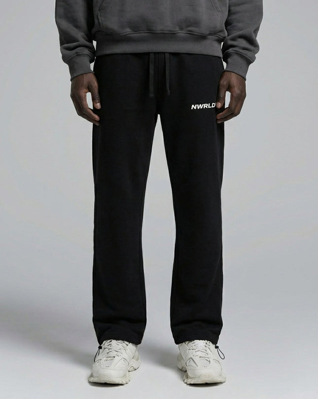 Close-up of the model's lower body wearing Essential Drawstring Straight-Leg Sweatpants