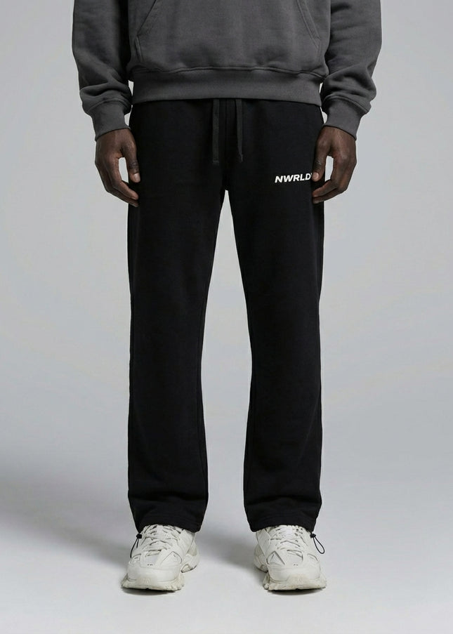 Close-up of the model's lower body wearing Essential Drawstring Straight-Leg Sweatpants