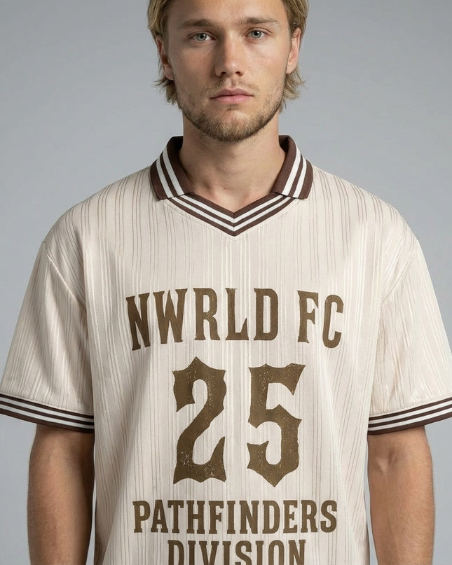 Close-up of the model wearing NWRLD 002 Pathfinders Football T-Shirt