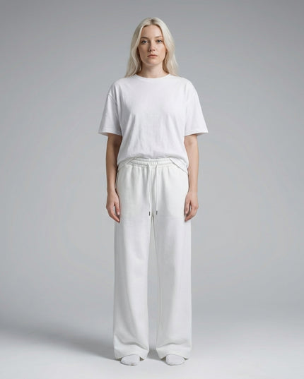 Full body view of the model wearing Essential Straight-Leg Sweatpants