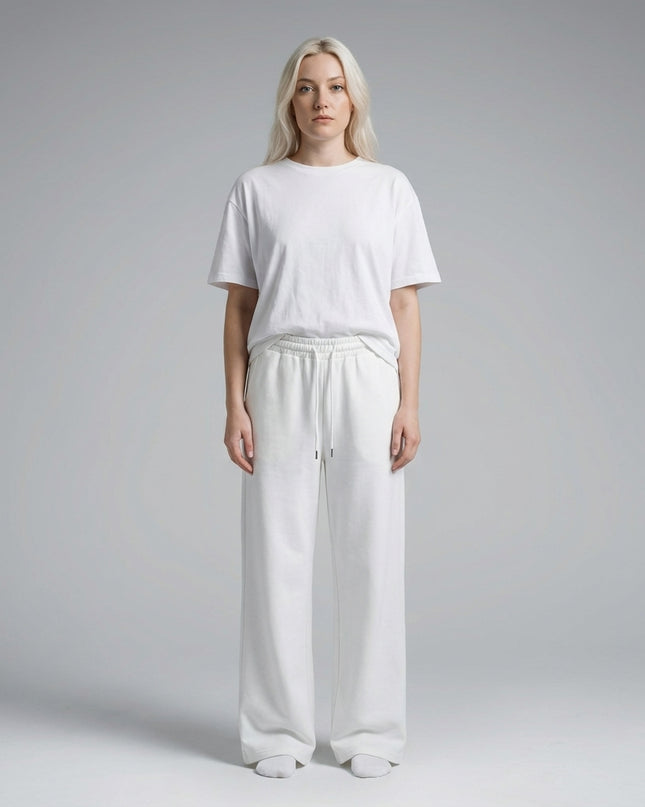 Full body view of the model wearing Essential Straight-Leg Sweatpants