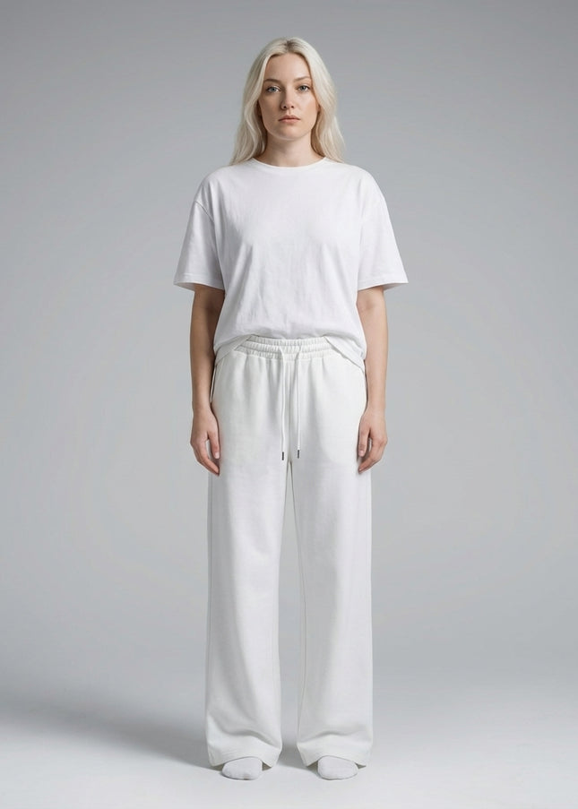 Full body view of the model wearing Essential Straight-Leg Sweatpants