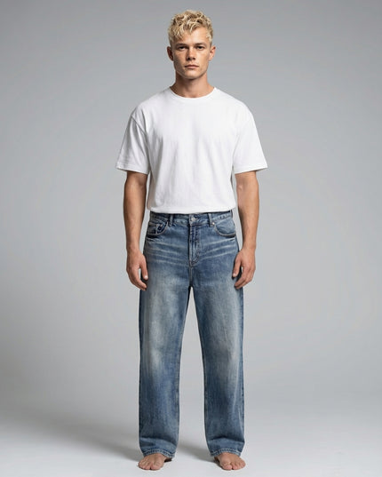 Full body view of the model wearing Sun Fade Heavyweight Denim Jeans