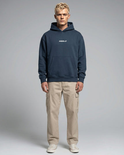 Full body view of the model wearing Essential Oversized Boxy Fit Fleece Hoodie