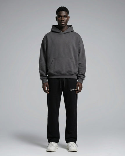 Full body view of the model wearing Essential Drawstring Straight-Leg Sweatpants