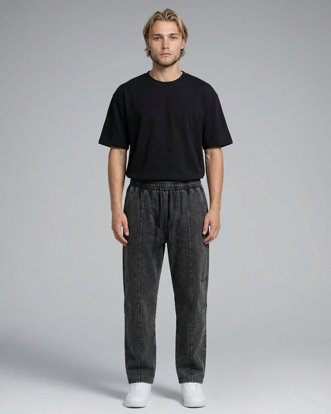 Full body view of the model wearing Snow Wash Drawstring Cotton Pants