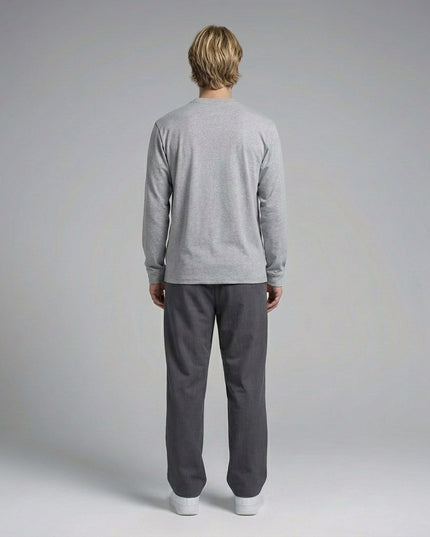 Back pose of the model wearing Essential Crewneck Long-Sleeve T-Shirt