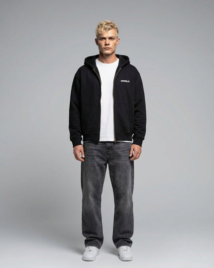 Full body view of the model wearing Essential Oversized Fleece Boxy Hoodie