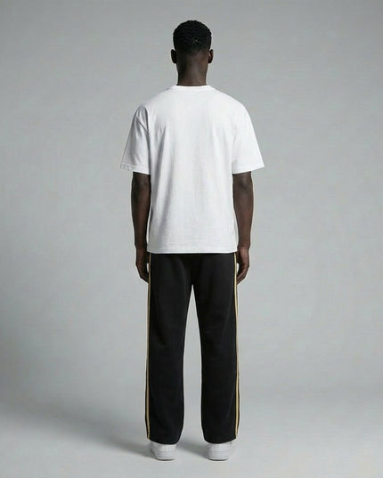 Back pose of the model wearing Contrast-Stitched Fleece Sweatpants