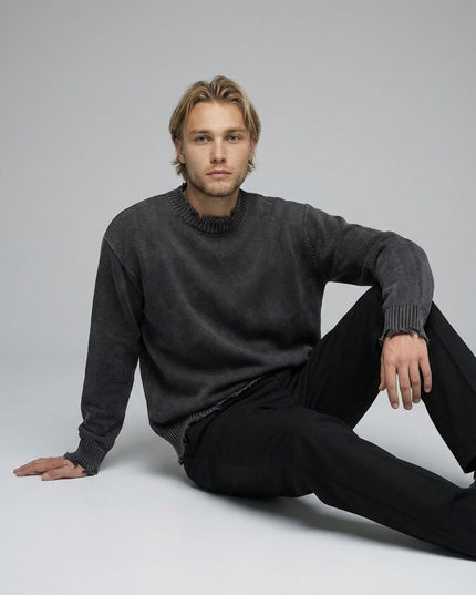 Model sitting while wearing Vintage Washed Hand-Frayed Sweater
