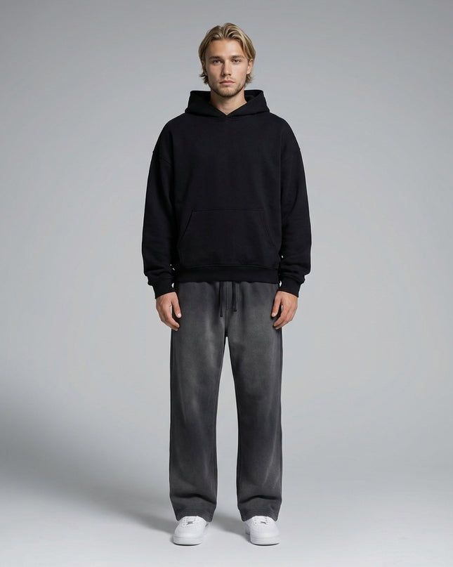 Full body view of the model wearing Sun Fade Raw Edge Straight-Leg Sweatpants
