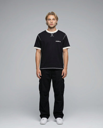 Full body view of the model wearing Contrast-Stitched Cotton T-Shirt